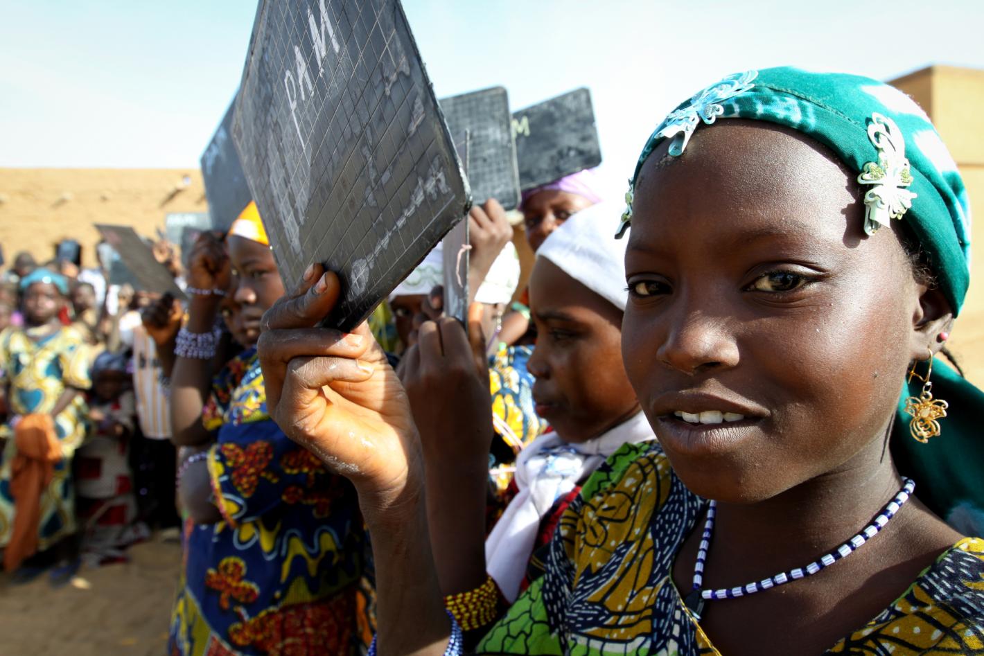 Young children at the World Food Programme (WFP) school feeding centre in Agarsamat, Tahoua Region, Niger.