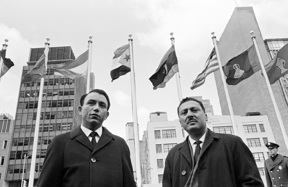 The Security Council voted unanimously on 12 December to recommend to the General Assembly the admission of the People's Republic of Southern Yemen to the United Nations. The flag of the People's Republic of Southern Yemen was raised at United Nations Headquarters.  From left to right are: Saif Ahmad Dhalee, Minister for Foreign Affairs of Southern Yemen, and Ahmed Ali Musaid, representative of Southern Yemen. 1967. UN Photo/UN Photo Library.