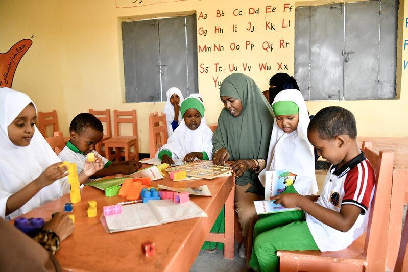 Vibrant classroom scene filled with young children